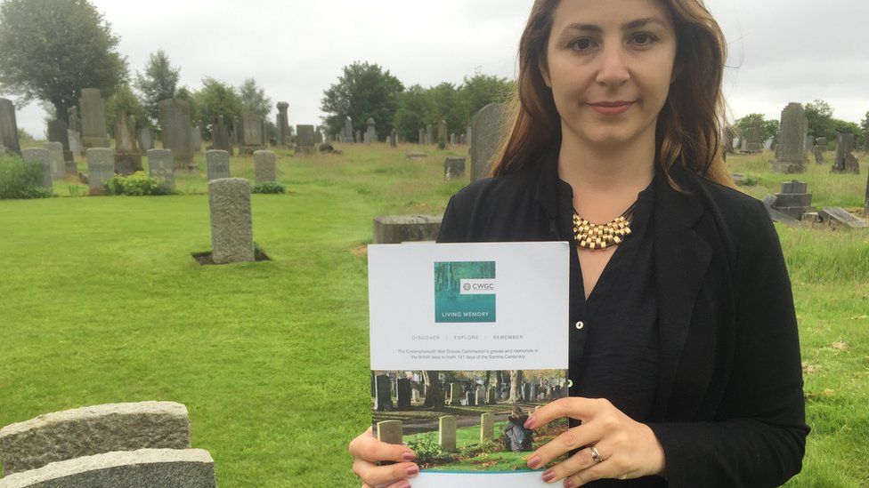 Jennie Sweeney from the CWGC holding the "Living Memory" resource pack