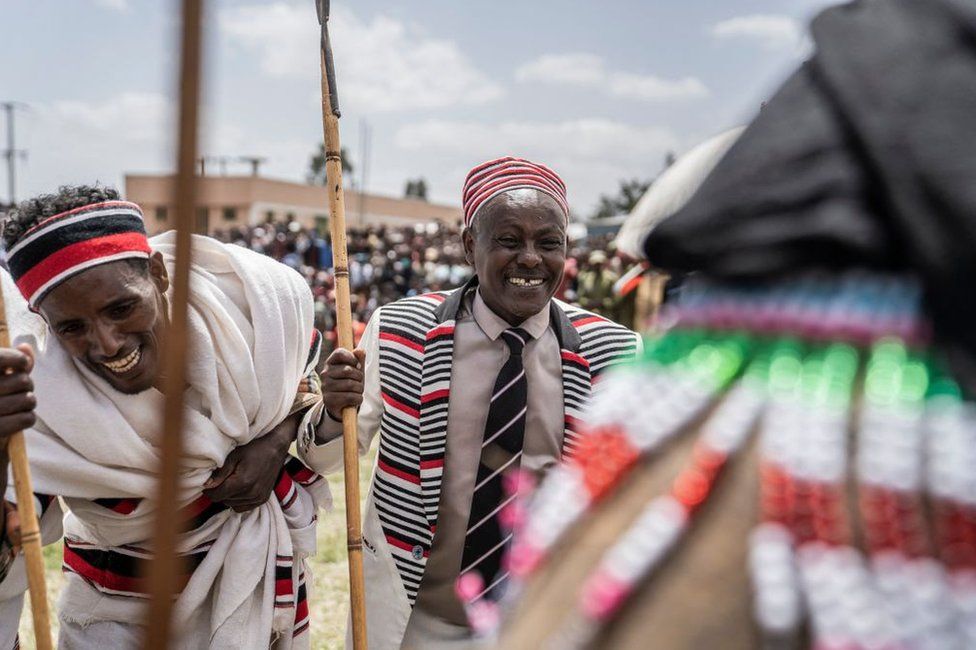 Men in traditional attires attend the first 'Great bekoji run' running event, in Bekoji, Ethiopia, on May 15, 2022. - Bekoji, a town 225 kms (139 miles) south of Addis Ababa is renowned for producing running phenoms who have collectively got 22 Olympic medals