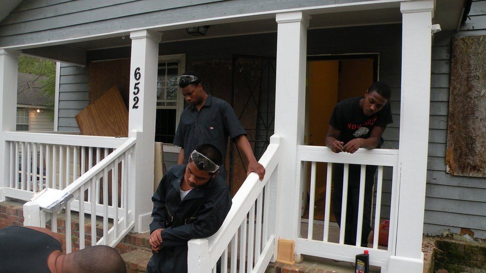 Men fixing house in Clayton Country
