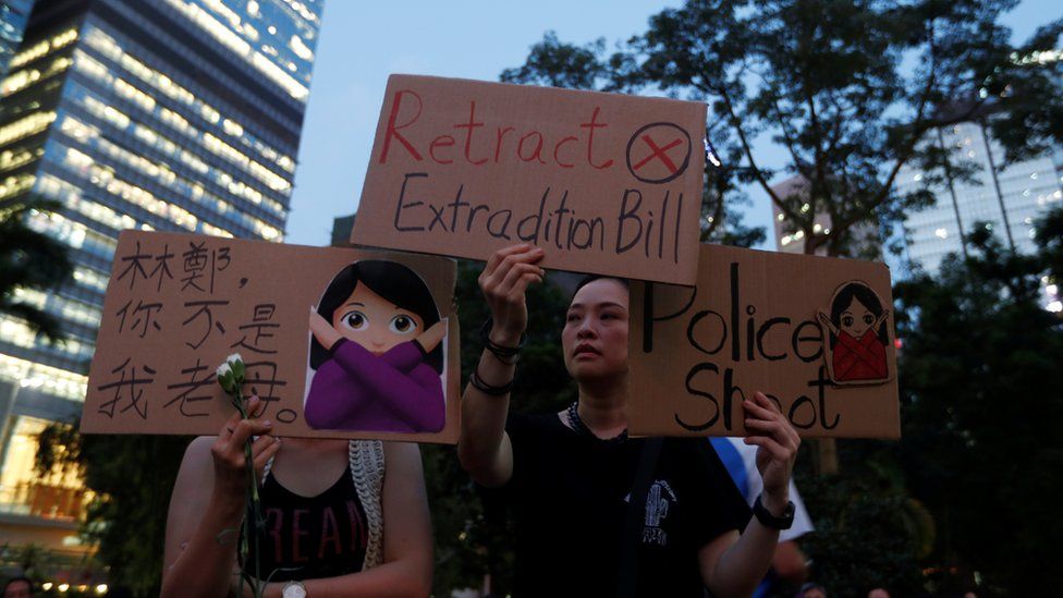 People attend a rally in support of demonstrators protesting against the proposed extradition bill with China, in Hong Kong