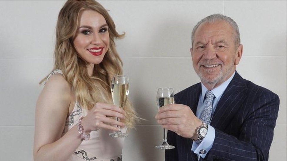 Alana Spencer toasts her Apprentice victory with Lord Sugar in December last year