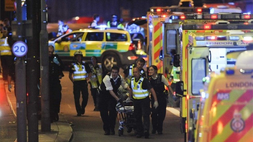 Police and medical staff at the London Bridge attack