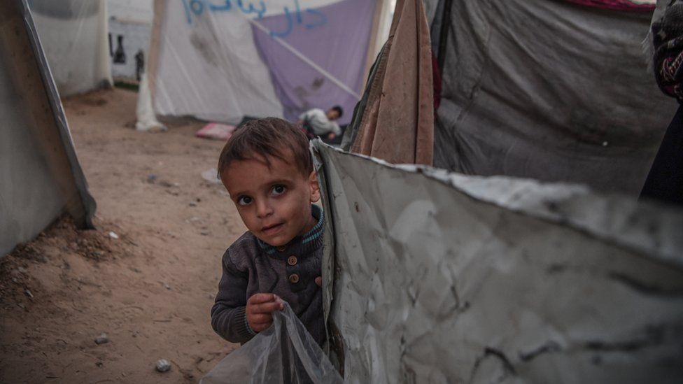 Palestinians are seen around their makeshift tents as they left their homes and took refuge in Rafah city in order to protect themselves from Israeli attacks and to ensure their safety in Rafah, Gaza on December 21, 2023
