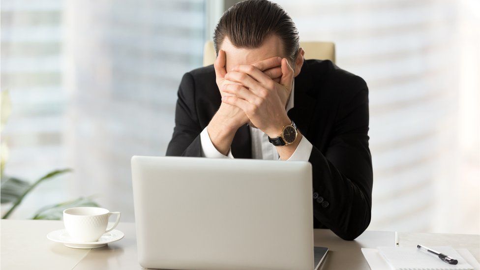 Stock image of a person at a computer