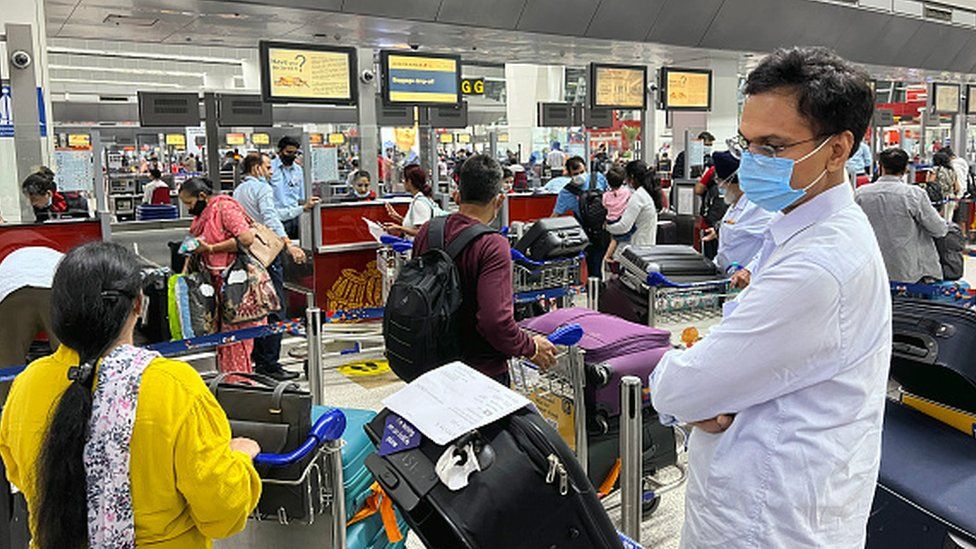 Crowd of travellers wait to check-in for their flight at Indira Gandhi International Airport (Delhi Airport) in Delhi, India, on May 31, 2022