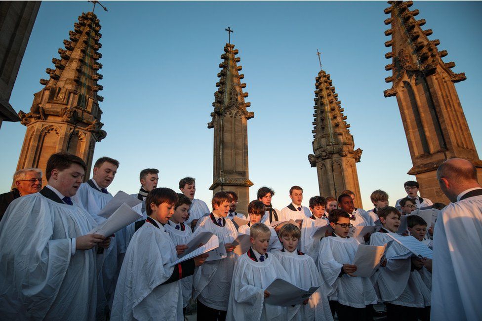 The Magdalen College Choir sing the Hymnus Eucharisticus from the top of the Great Tower, Magdalen College, Oxford