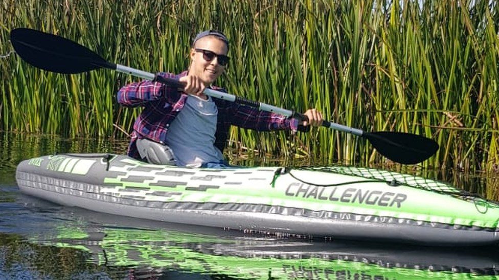 Jayden Booroff in a canoe