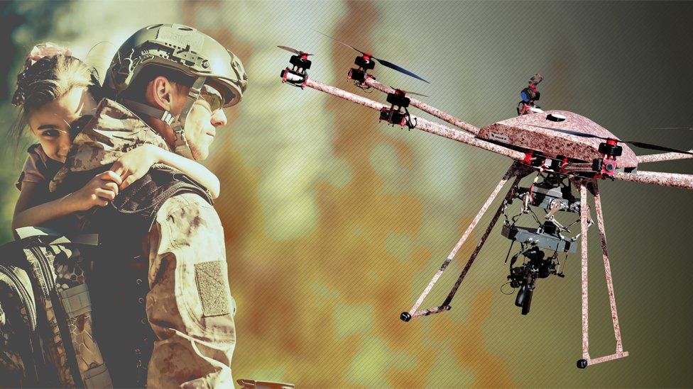 A drone armed with a machine gun next to a soldier holding a child
