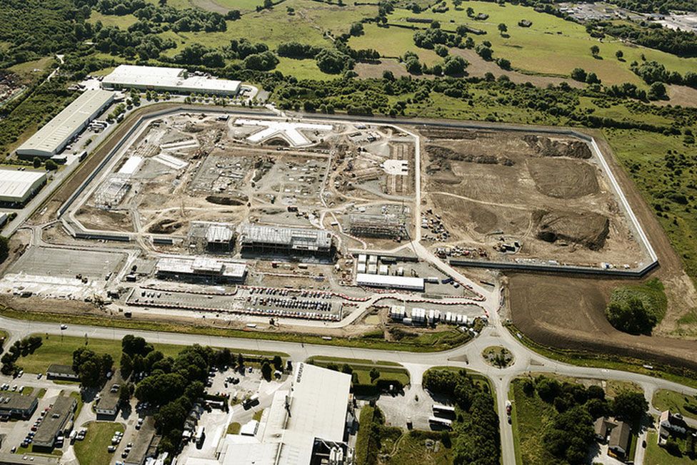 Aerial image of the prison site during construction