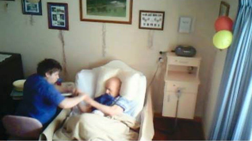 In secretly captured footage, aged care worker Corey Lyle Lucas grabs the arms 89-year-old resident Clarence Hausler