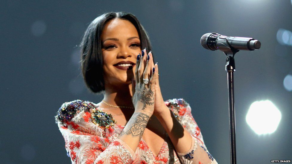 Rihanna performing at a concert in March