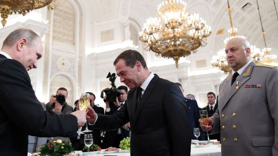 Vladimir Putin, Dmitry Medvedev and Sergei Surovikin at the award ceremony for the Russian military who fought in Syria, 2017