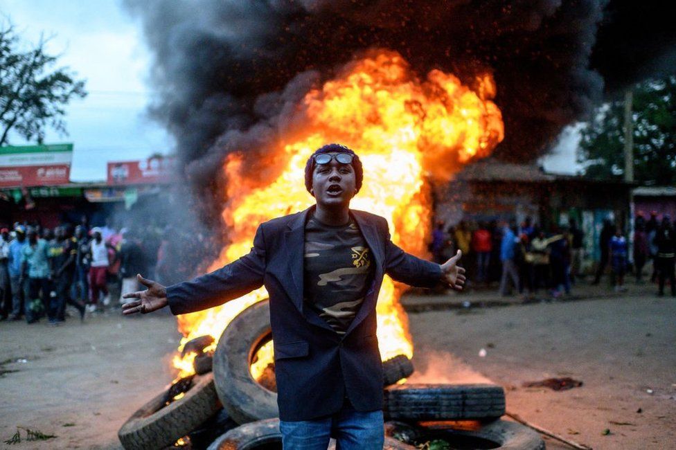 A supporter of Kenya's Azimio La Umoja Party presidential candidate Raila Odinga during a protest against the results of Kenya's general election in Kibera, Nairobi.