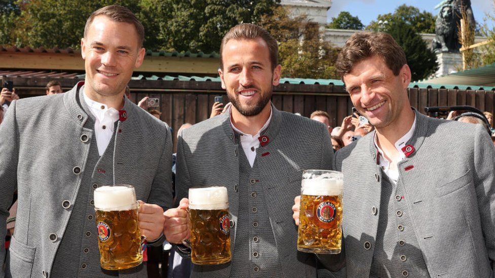 England captain Harry Kane with Bayern Munich team mates Manuel Neuer and Thomas Muller holding beers.