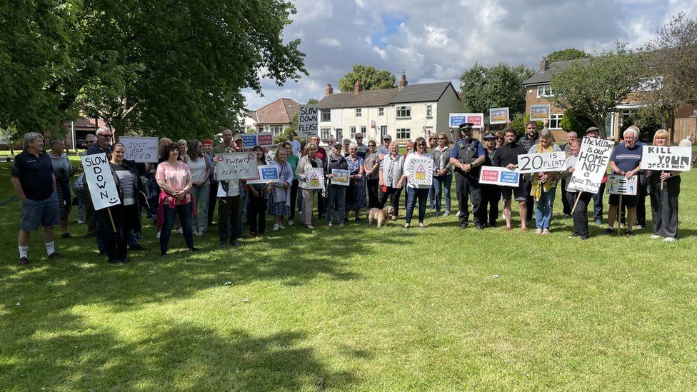 Protestors gathered on Wolviston village green