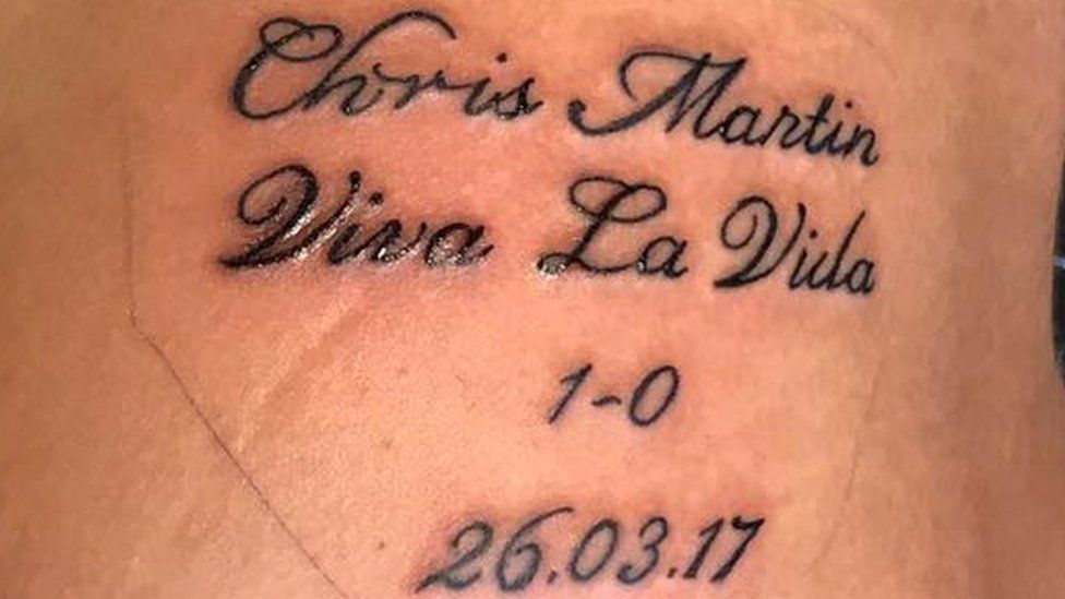 Chris Martin stops gig to design tattoo for mega fan
