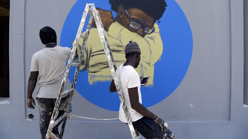 Members of the Senegalese graffiti collective RBS Crew painting a wall at Cheikh Anta Diop University in Dakar, Senegal - Saturday 21 March 2020