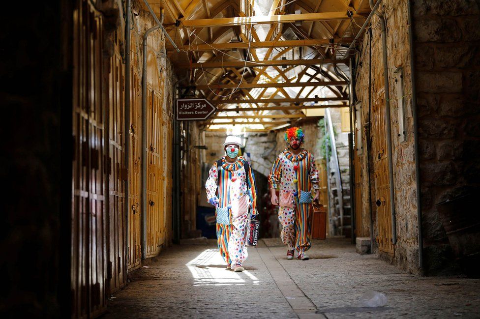 Clowns arrive to entertain Palestinian children in Hebron