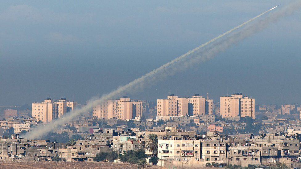 A rocket is launched from Gaza towards Israel, as seen from Sderot, on 15 November 2012