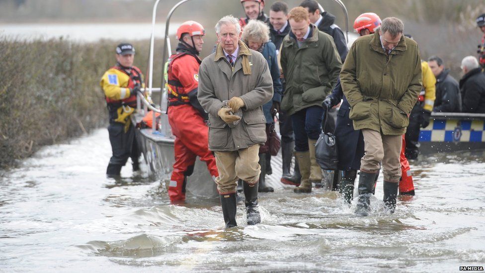 Prince Charles visiting Muchelney village by boat during the 2014 Somerset floods