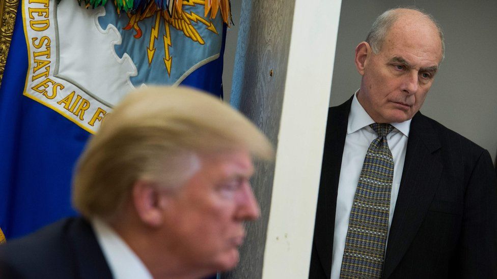 In this file photo taken on February 2, 2018, White House Chief of Staff John Kelly looks on with US President Donald Trump in the foreground