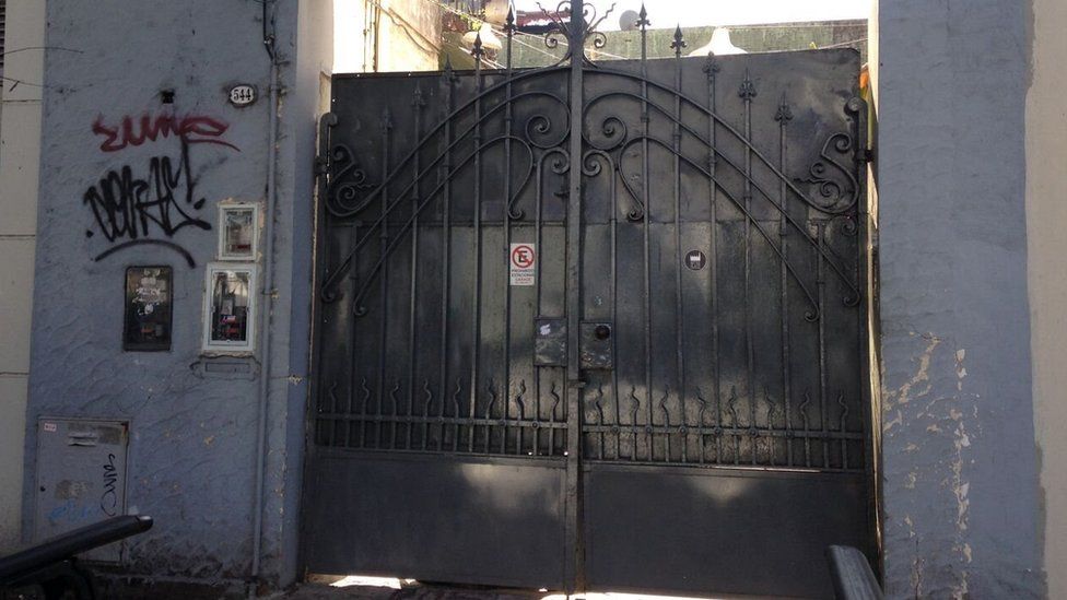 Gate leading to the Puccio home in San Isidro