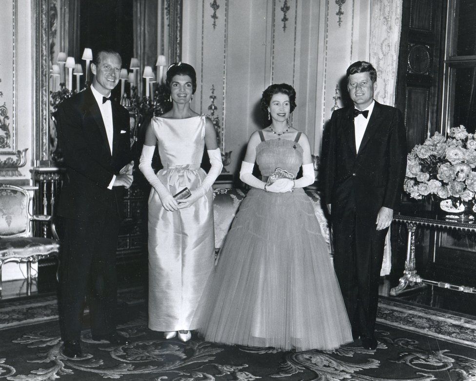 At Buckingham Palace during a banquet held in his honour, President John F Kennedy and his wife, First Lady Jacqueline Kennedy, pose with Queen Elizabeth II and her husband, Prince Philip, Duke of Edinburgh, London, United Kingdom, June 15, 1961.