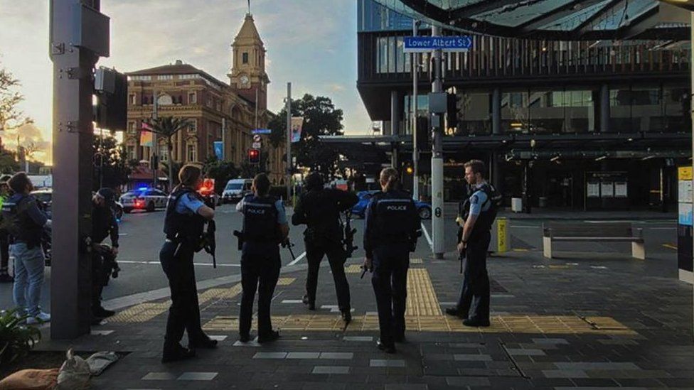 A supplied screenshot taken from TV footage obtained on Thursday, July 20, 2023, of NZ police on the scene in Auckland CBD, New Zealand, following reports of gunfire.