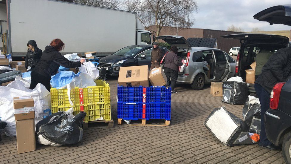 Hermes parcels sorted in makeshift Northampton car park depot BBC News