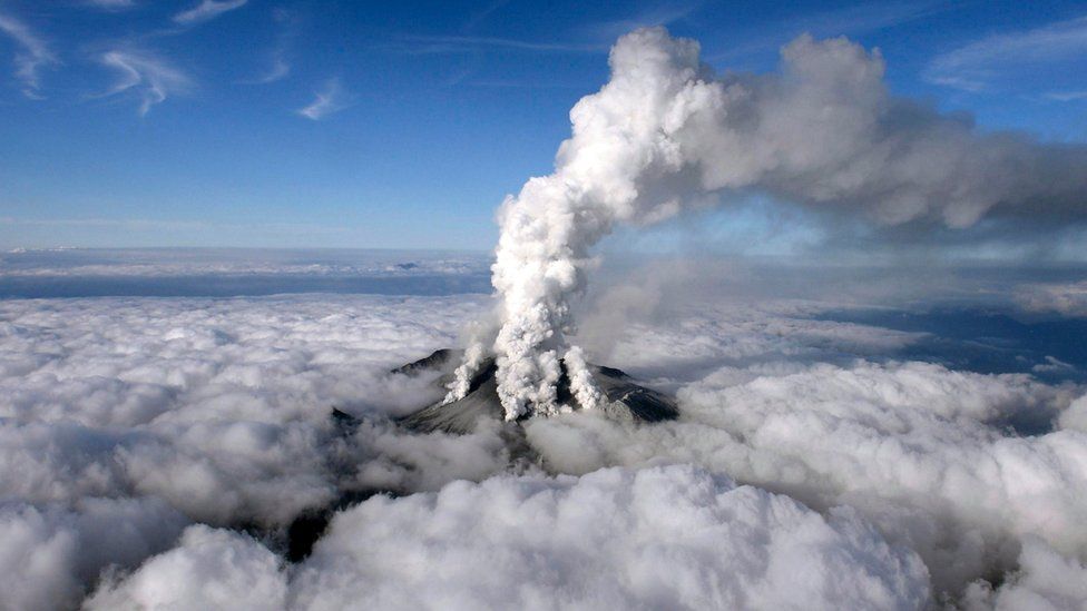 Volcanic smoke rises from Mount Ontake in Japan on 27 September 2014, after an eruption that killed a number of climbers