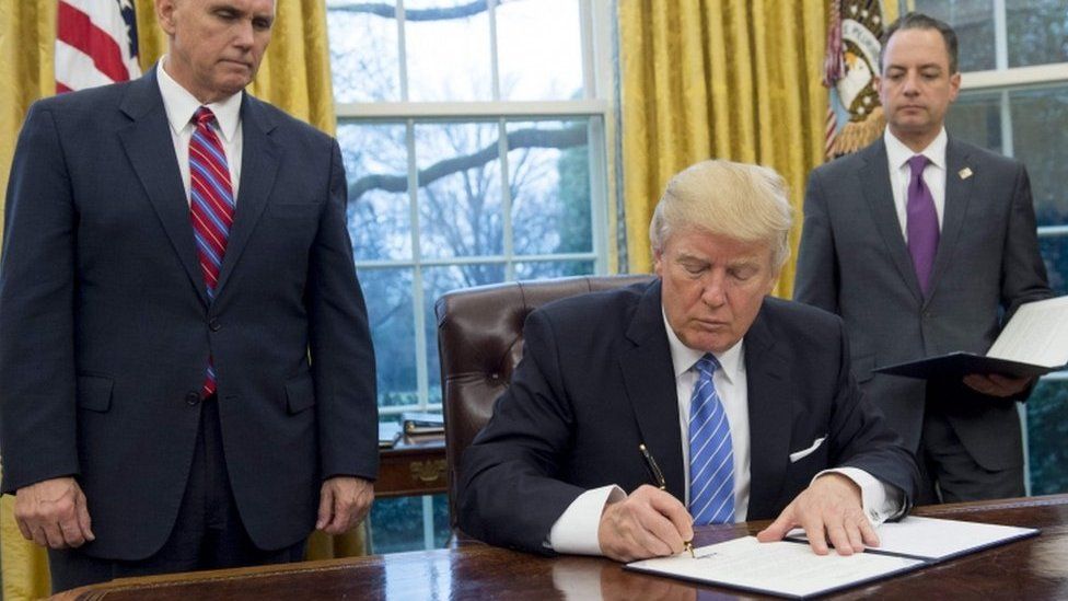 Mr Trump signed three orders on his first Monday morning as president