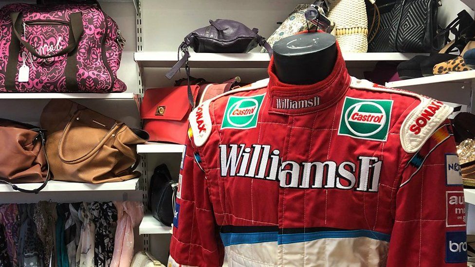 An anonymous donor delivered the racing suit to the shop