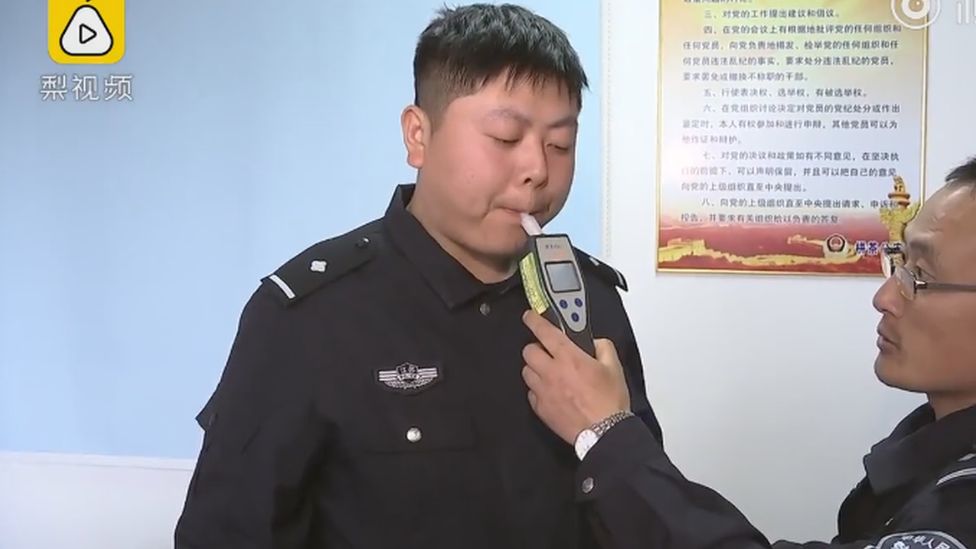 A Chinese officer failing a breathalyser after eating durian