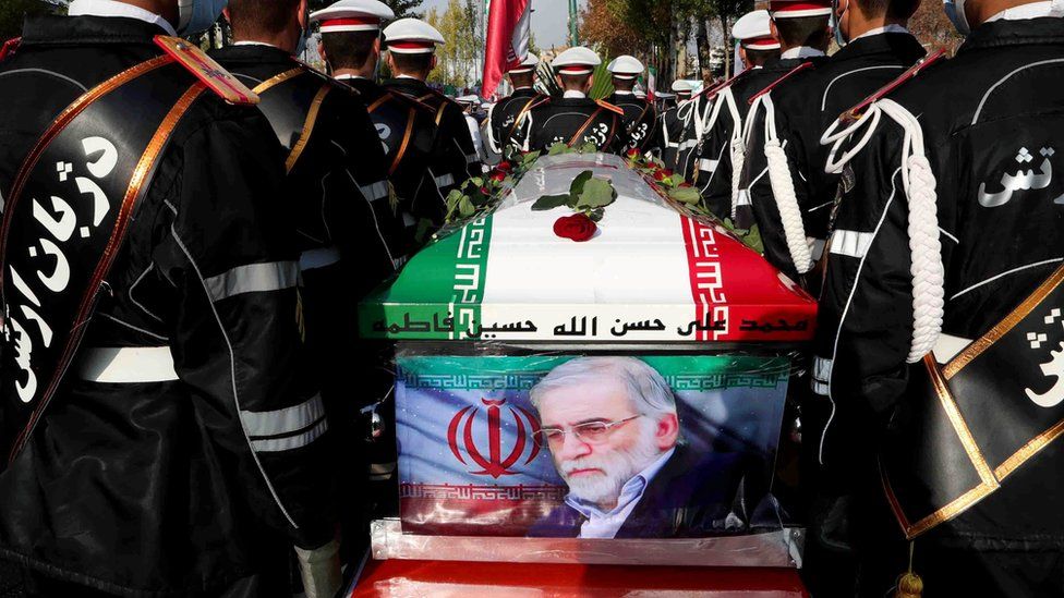 Iranian troops carry the coffin of assassinated nuclear scientist Mohsen Fakhrizadeh in Tehran, Iran (30 November 2020)