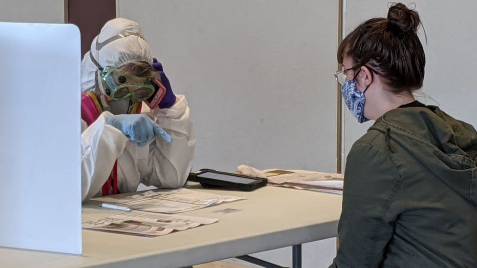 Elections Chief Inspector Mary Magdalen Moser runs a polling location in Kenosha, Wisconsin, in full hazmat gear as the Wisconsin primary kicks off despite the coronavirus pandemics on 7 April, 2020