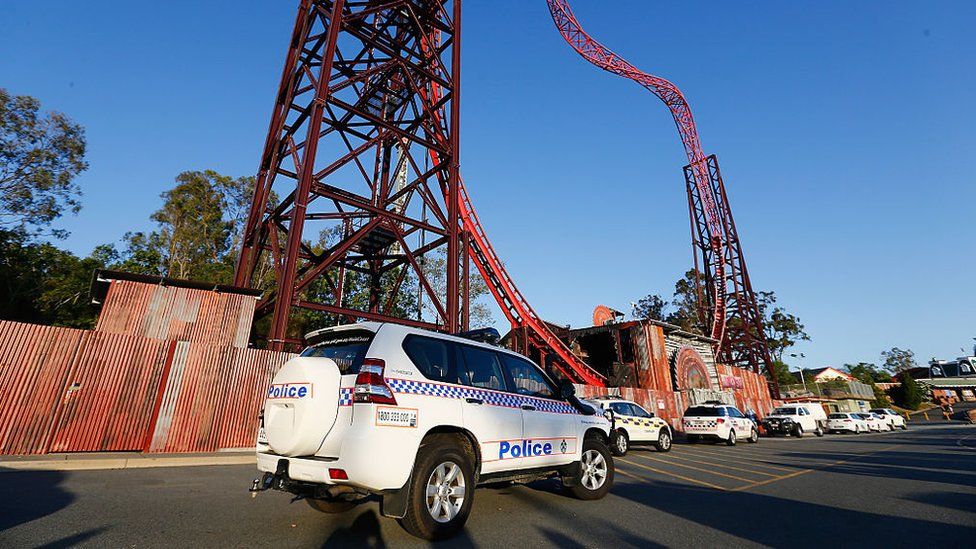 Police cars parked outside the Gold Coast theme park