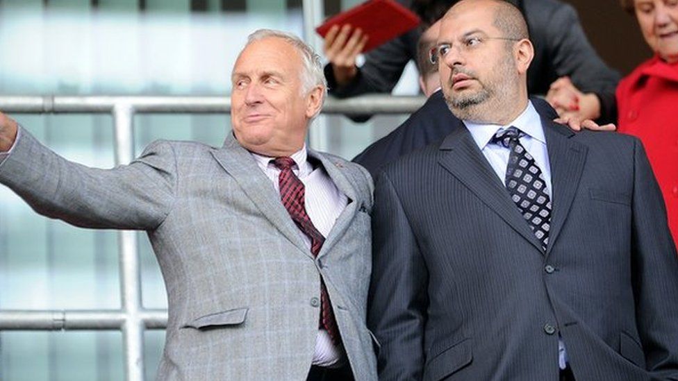 Prince Abdullah Bin Mosaad Abdulaziz Al Saud and co-owner Kevin McCabe watch Sheffield United play Rotherham in September 2013