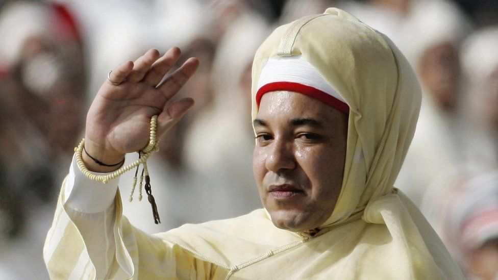 King Mohammed VI of Morocco waves to crowds during Throne Day Celebrations at the Royal Palace on July 31, 2006 in Rabat, Morocco