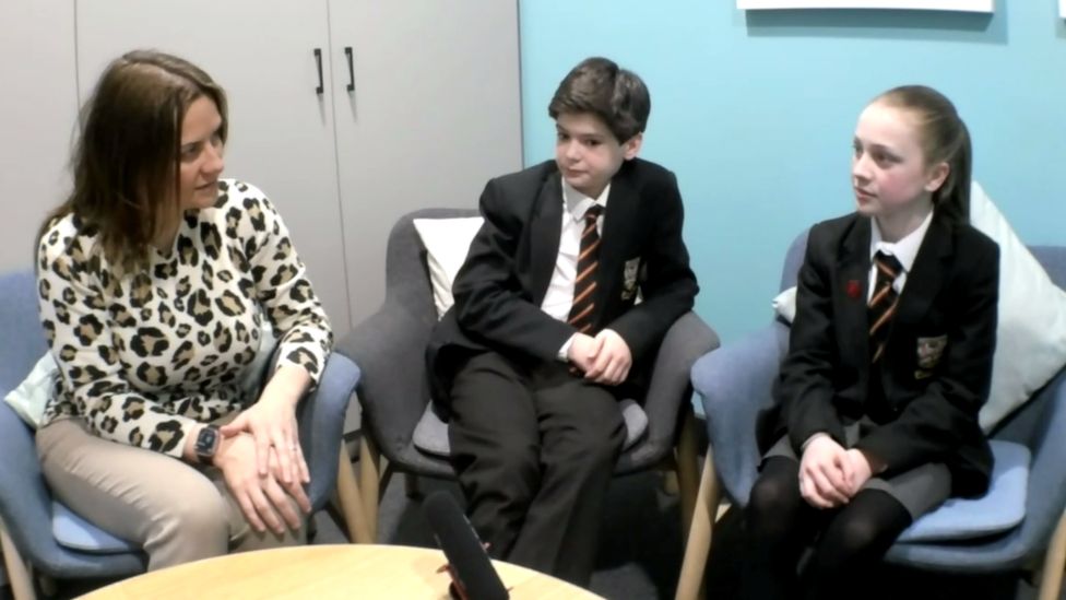 Teacher Ms Lyons speaks to pupils Eli and Alex about her experiences growing up in Northern Ireland