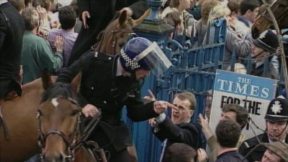 Fans argue with mounted police office outside Hillsborough