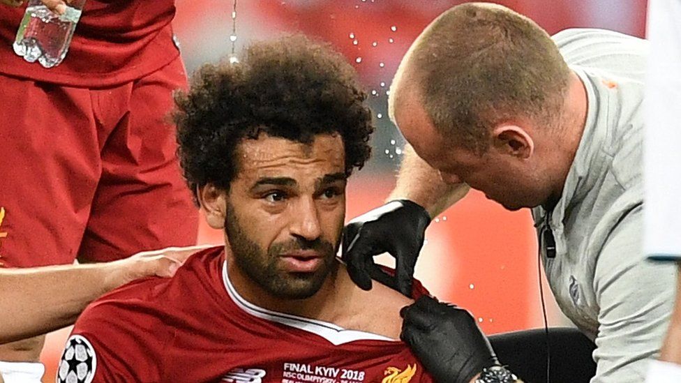 Mohamed Salah receives treatment during the Champions League final