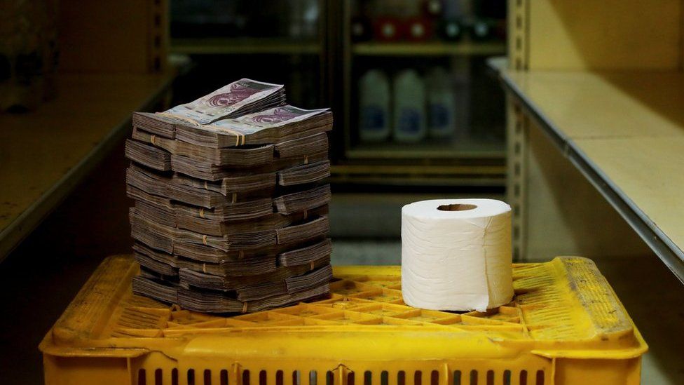 A toilet roll next to 2,600,000 bolivars