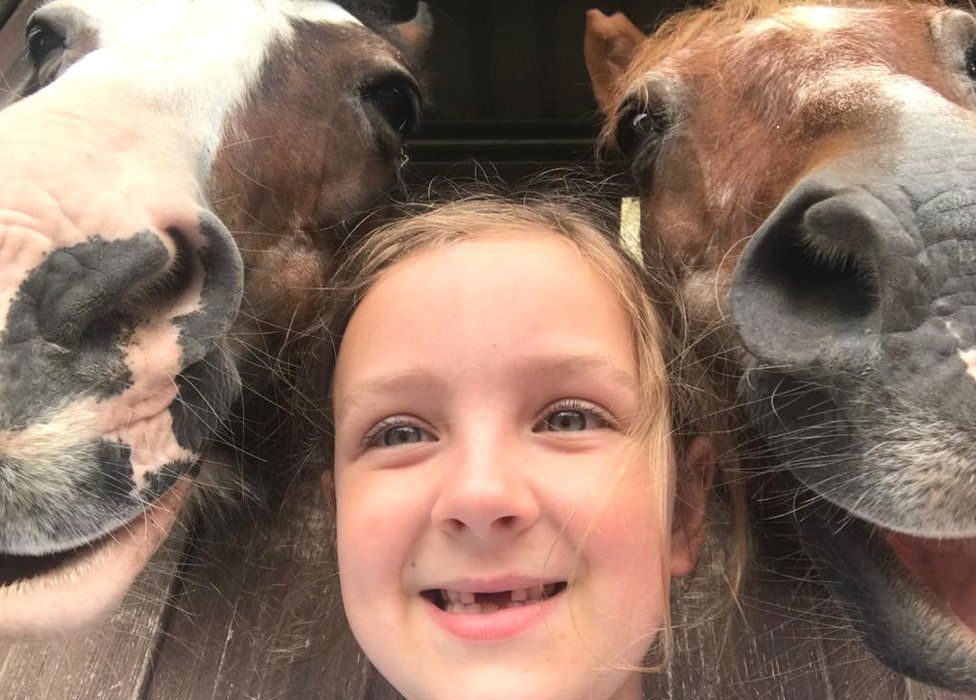 Girl with horses