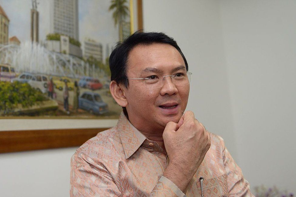 Basuki Tjahaja Purnama, known by his nickname Ahok, speaks to journalists at his office in Jakarta in 2014