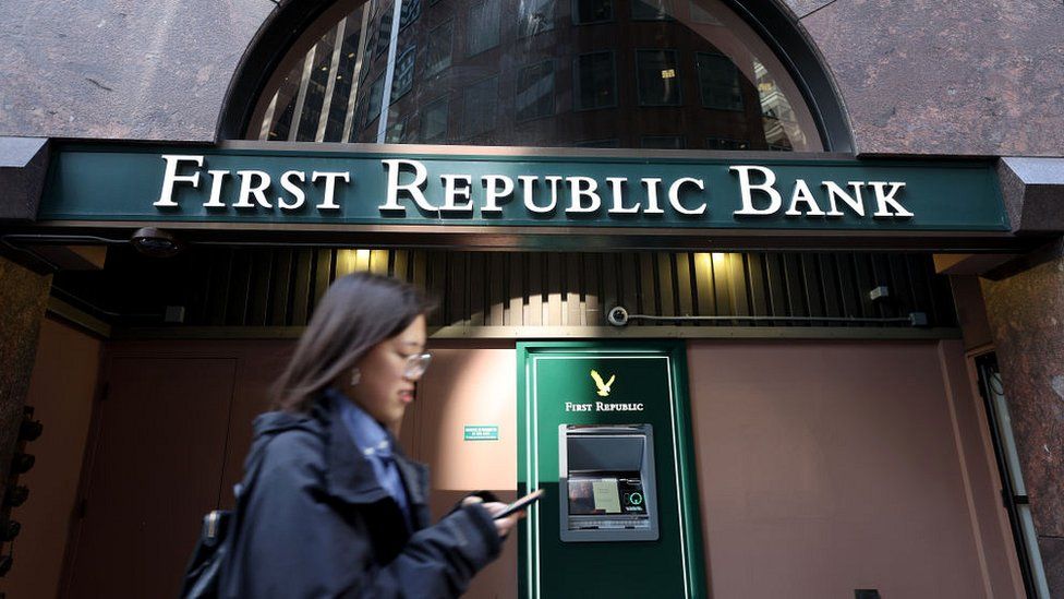 A pedestrian walks by a First Republic Bank office in San Francisco, California.