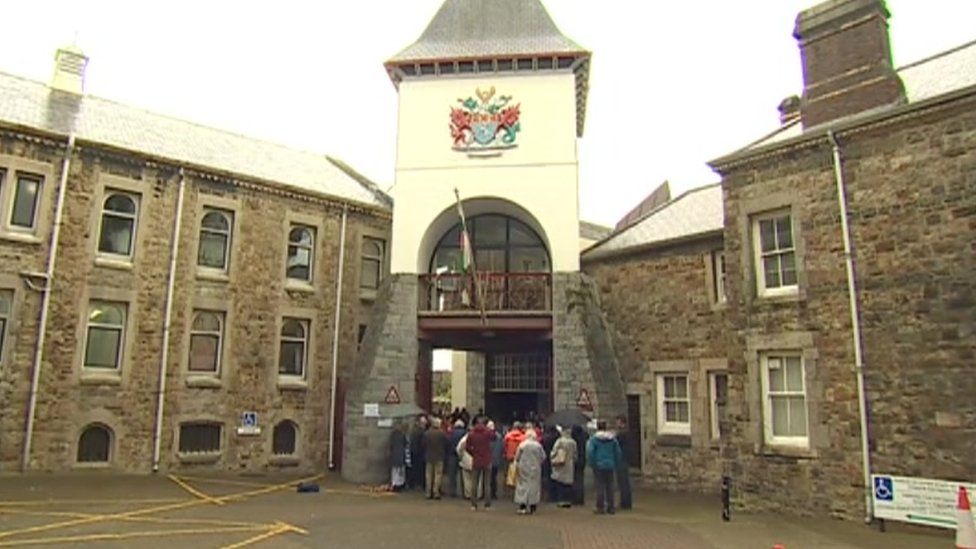 Protestors gathered outside Gwynedd council's chamber on Friday