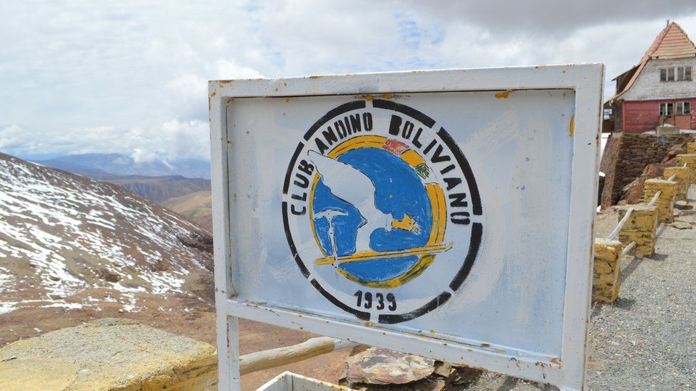 A rusty sign reads: Club Andino Boliviano skiing club