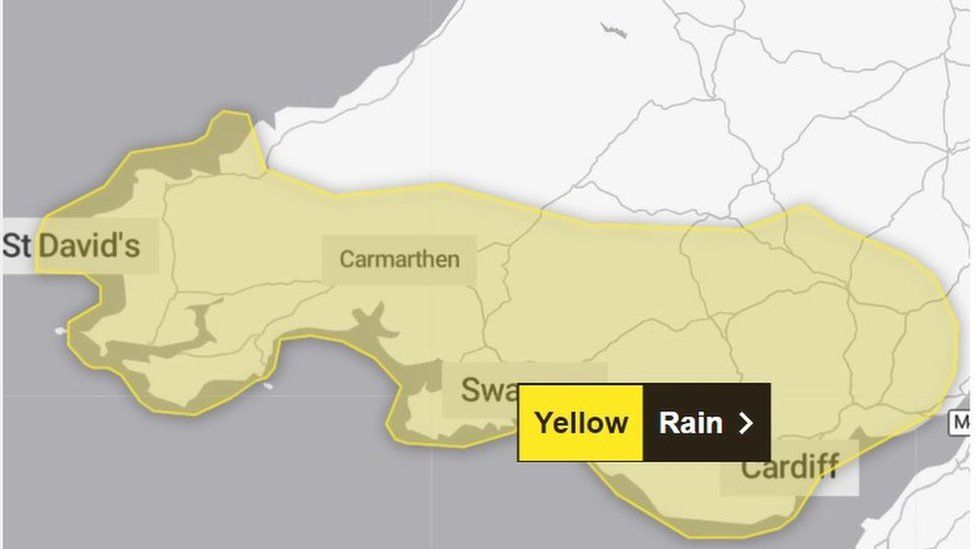 Weather map showing yellow rain warning across south Wales