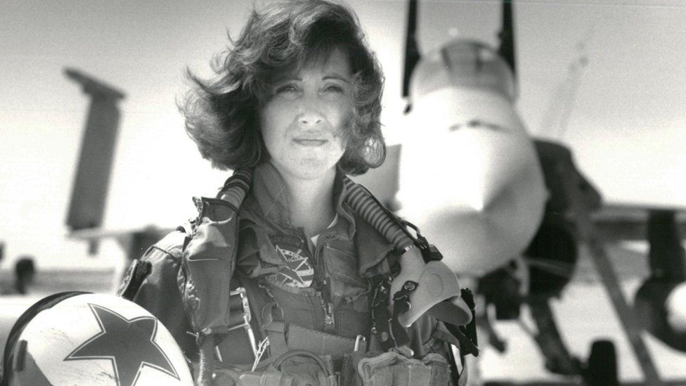 U.S. Navy Lieutenant Tammie Jo Shults, who is currently a Southwest Airlines pilot, poses in front of a Navy F/A-18A in this 1992 photo released in Washington, DC, U.S., April 18, 2018.