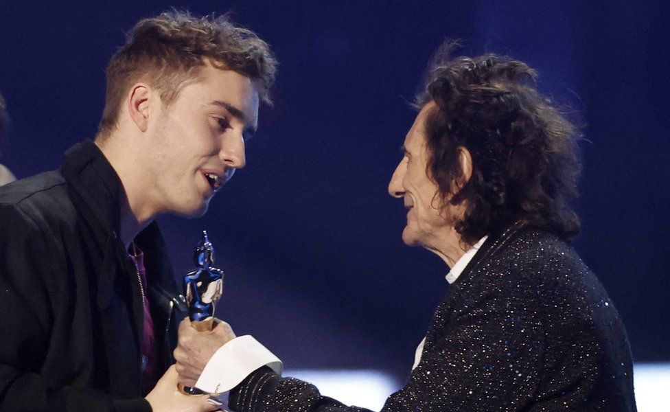 Sam Fender is presented the award for Best Alternative/Rock Act by Ronnie Wood at the Brit Awards at the O2 Arena on 8 February 2022